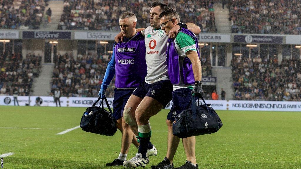 Cian Healy is fored off with an injury