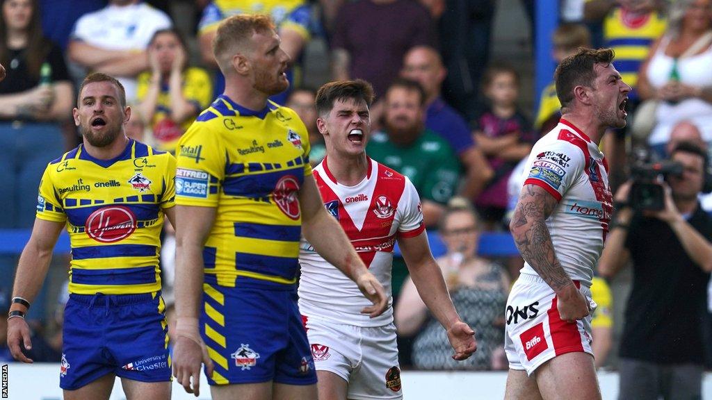 Mark Percival (right) scored 12 of St Helens' 24 points against Warrington Wolves