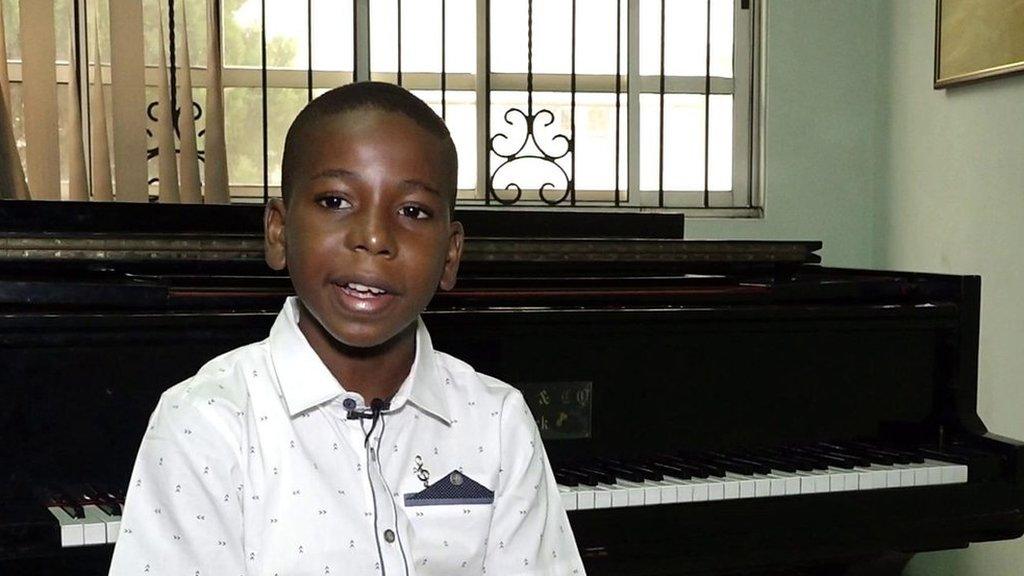 11-year-old piano prodigy Joshua Akinotanhe.