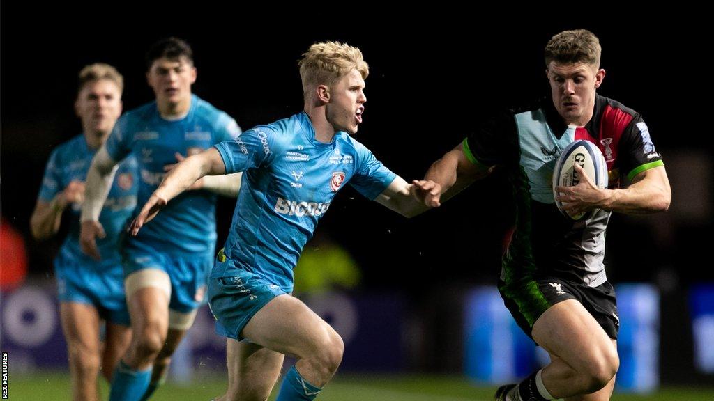 Gloucester players chase Luke Northmore during their Premiership defeat to Harlequins