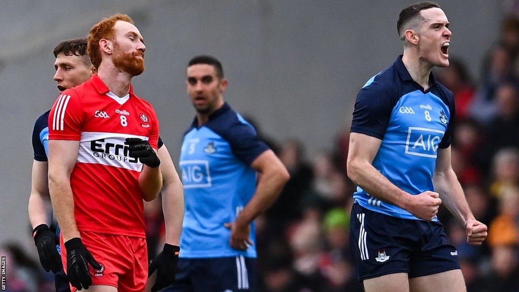 Dublin's Brian Fenton celebrates after winning a free at Celtic Park as Derry's Conor Glass shows his disappointment