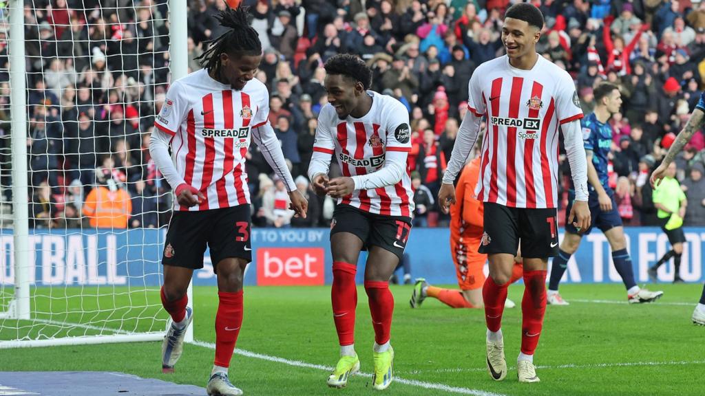 Sunderland players celebrate scoring against Stoke