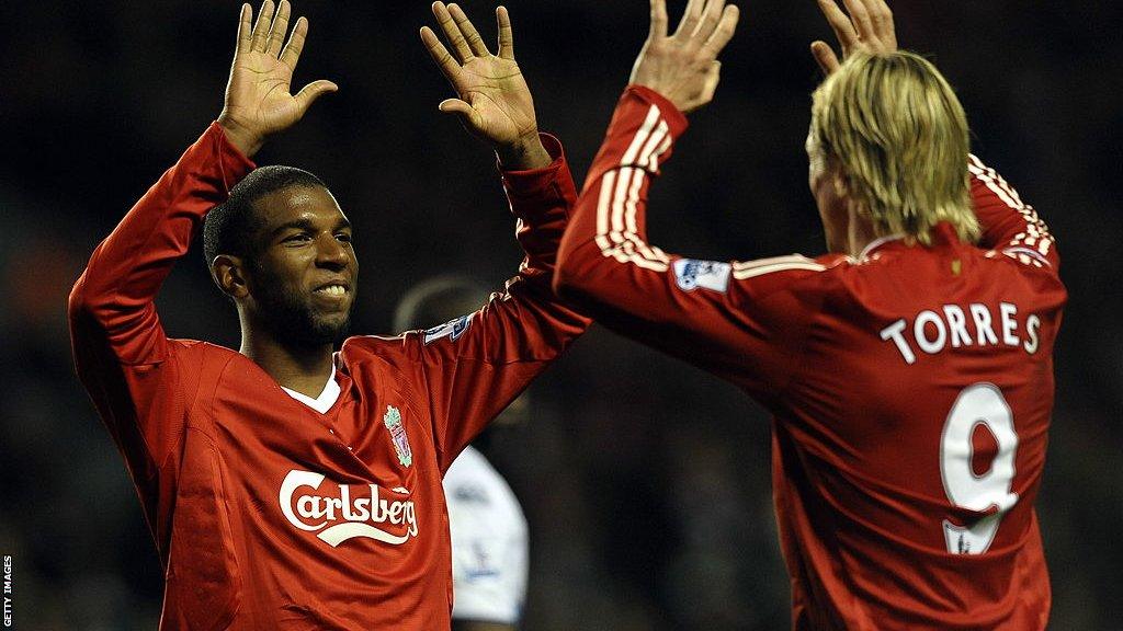 Ryan Babel and Fernando Torres high-five