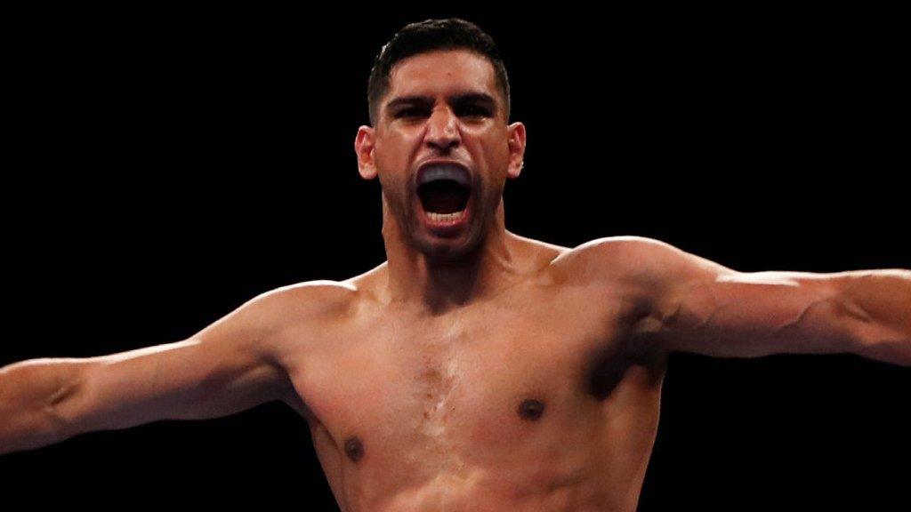 Amir Khan celebrates