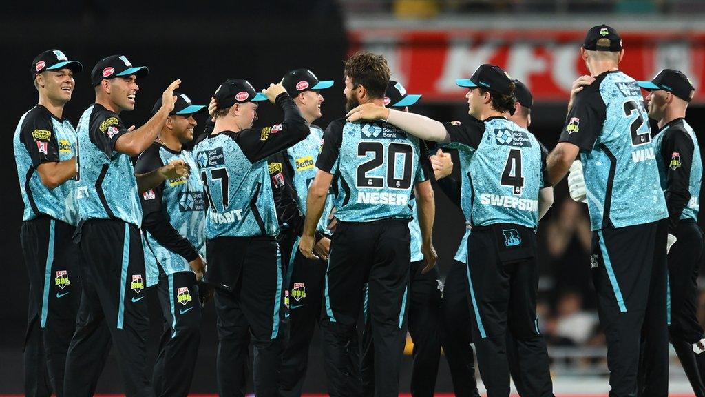 Brisbane Heat celebrate during their 103-run victory over Melbourne Stars