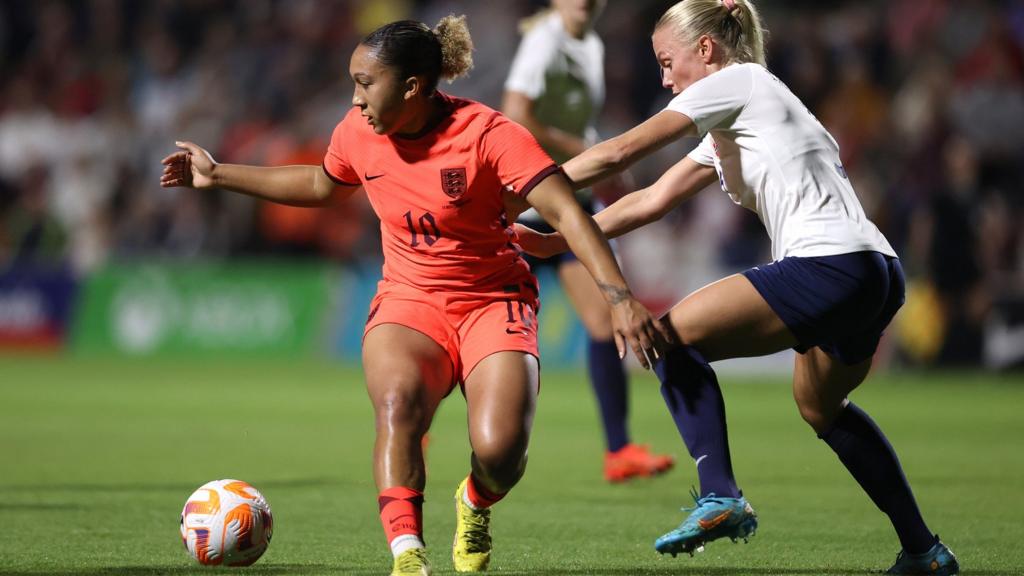 Lauren James of England battles for possession with Mathilde Hauge Harviken of Norway