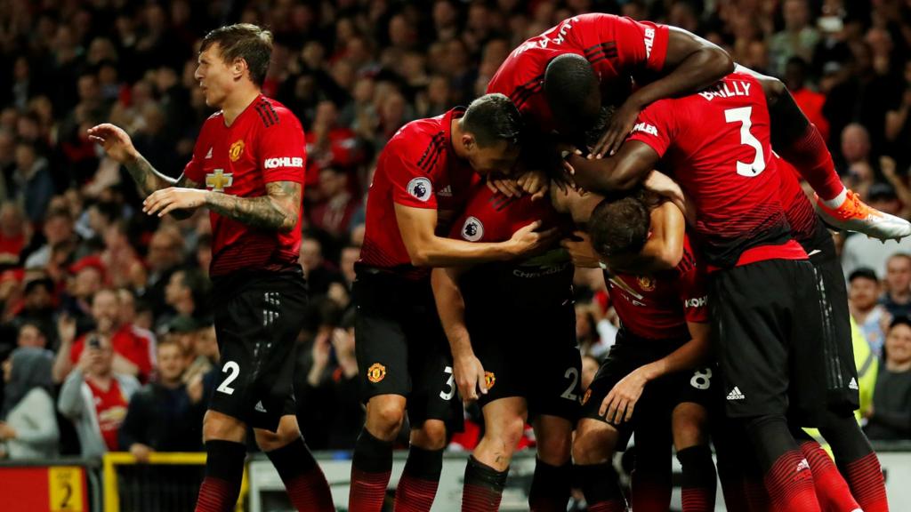 United celebrate Shaw goal