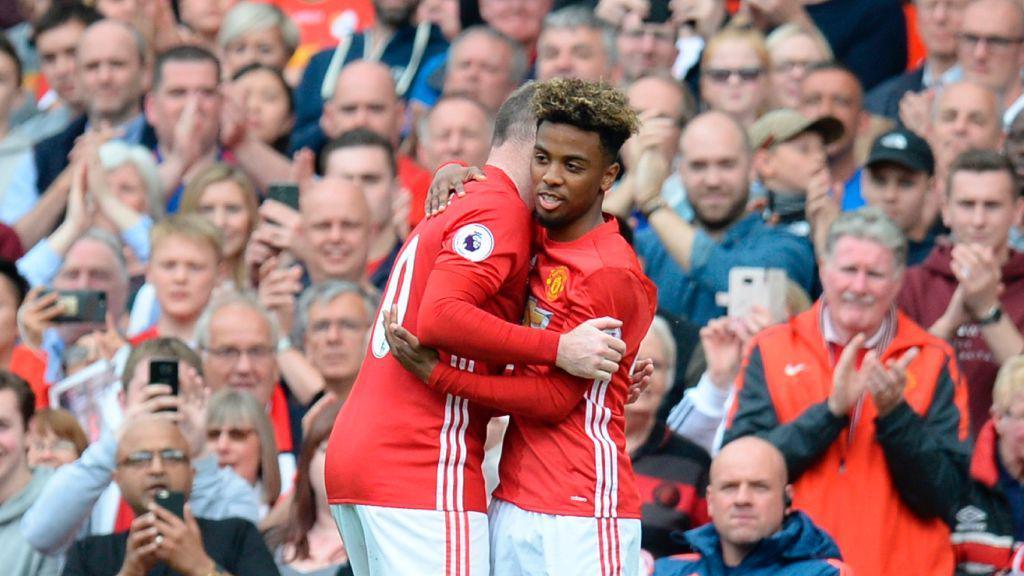 Angel Gomes is embraced by Wayne Rooney as he makes his Manchester United debut as a substitute