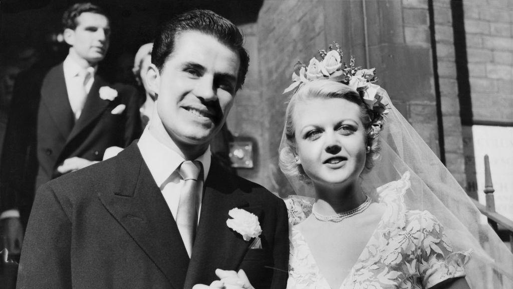 Actress Angela Lansbury after her wedding to actor Peter Shaw (1918 - 2003) at the Chapel of St Columba's Church House in Lennox Gardens, Kensington, London, 12th August 1949. (Photo by Fred Ramage/Keystone/Hulton Archive/Getty Images)