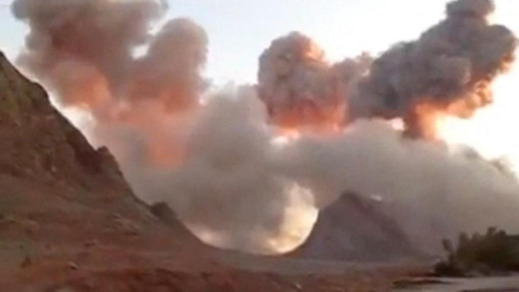 Smoke in mountains at missile site