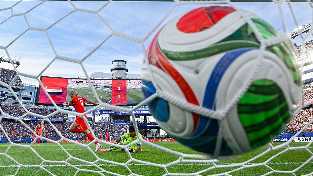 Erling Haaland scoring a goal.