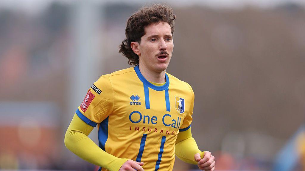 Aaron Lewis in action for Mansfield Town