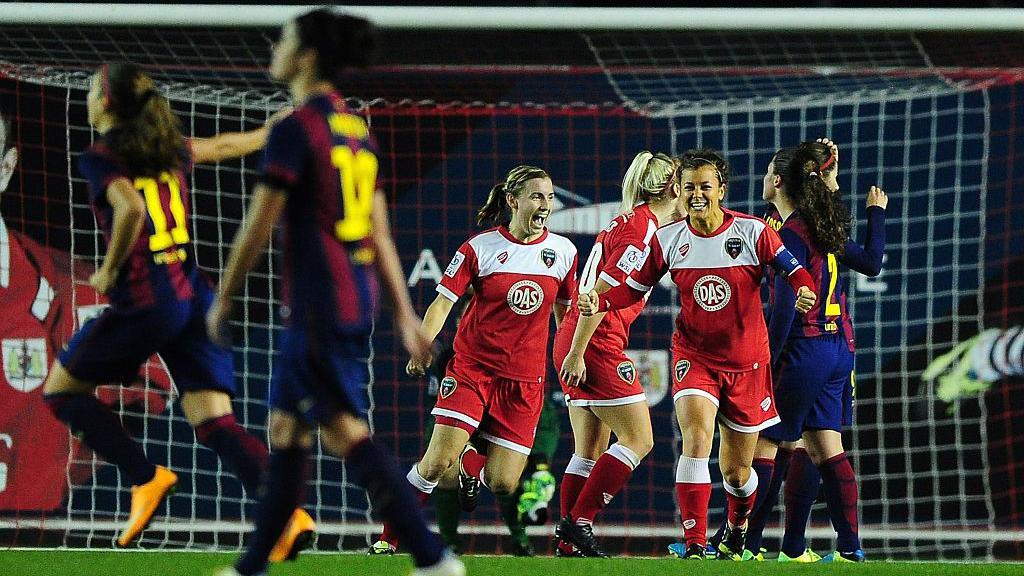 Bristol Academy players celebrate at the final whistle as their win against Barcelona in the 2014 Champions League is confirmed