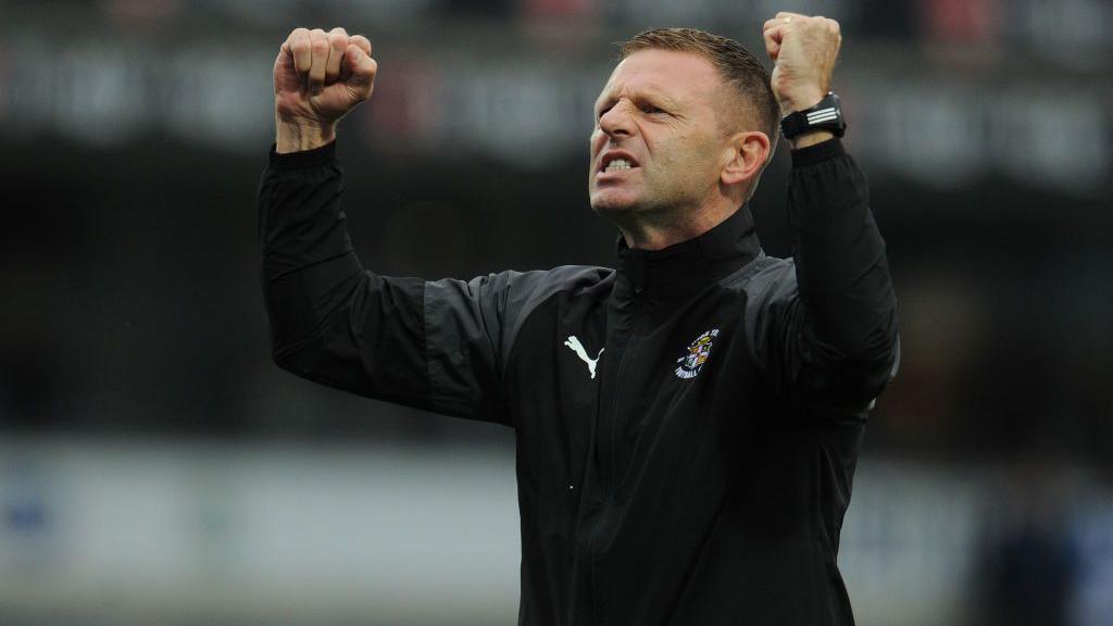 Graeme Jones celebrates a win at Luton