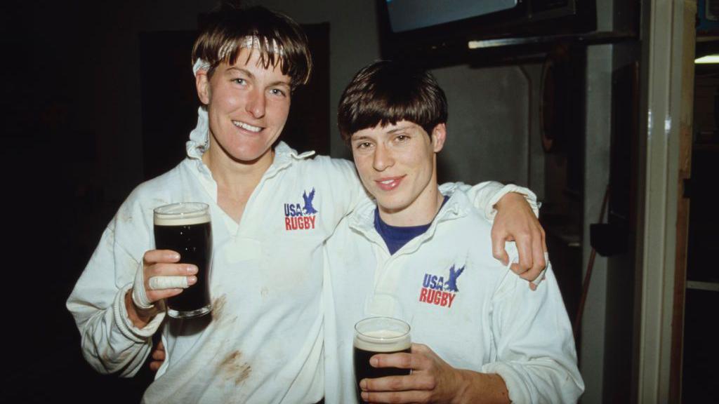 USA players celebrate with a pint of Guinness
