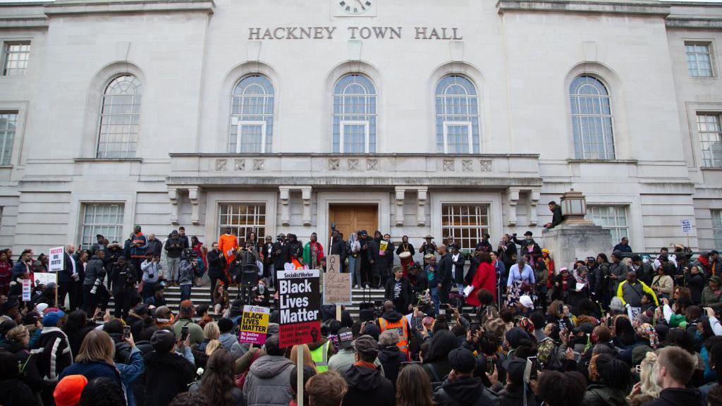 Supporters of Child Q seen outside Hackney Town Hall during the rally.