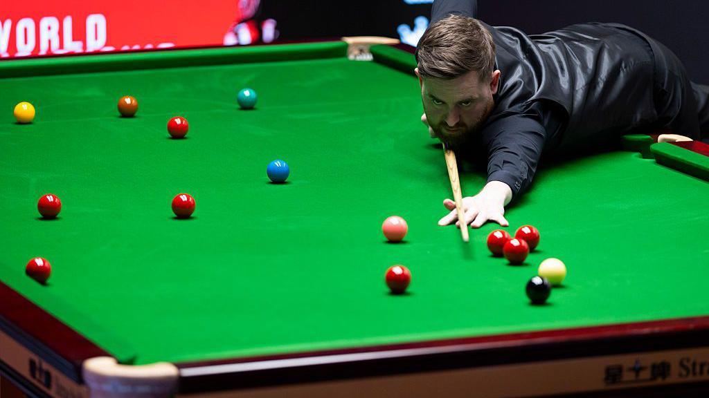 Jak Jones takes a shot