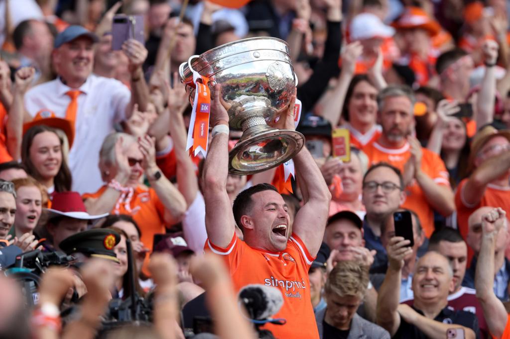 Aidan Forker lifts the Sam Maguire Cup