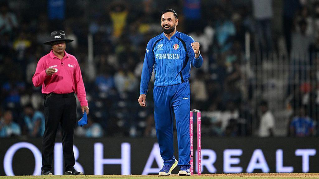 Mohammad Nabi of Afghanistan celebrates