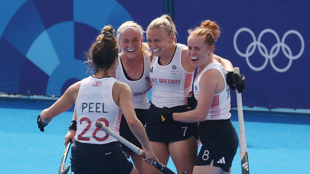 The Team GB women's hockey team celebrating during a winning goal