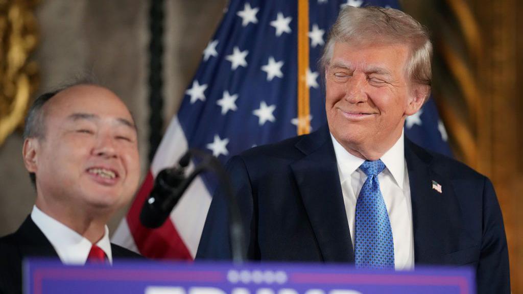 U.S. President-elect Donald Trump looks on as SoftBank CEO Masayoshi Son delivers remarks at Trump’s Mar-a-Lago resort on December 16, 2024 in Palm Beach, Florida.