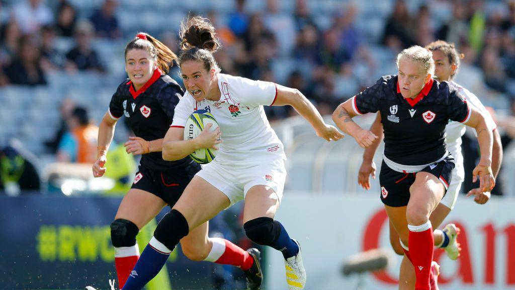 Emily in action against Canada.