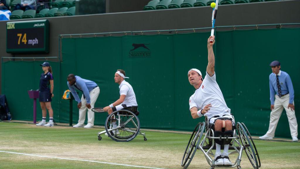 Hewett and Reid playing during Wimbledon 2021.