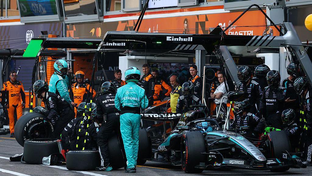 George Russell leaves the pits after stopping at the Mercedes garage during the Monaco Grand Prix