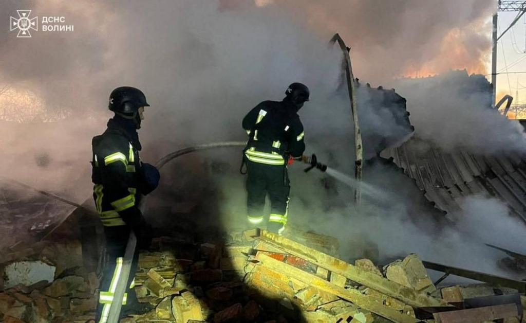  Fire fighters extinguish smouldering ruins of a destroyed building, Volyn region: Firefighters work at a site of a Russian missile strike, amid Russia's attack on Ukraine, in Volyn region, Ukraine