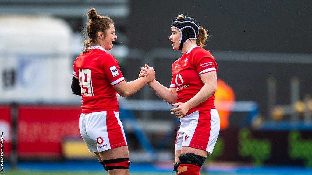 Kate Williams and Bethan Lewis high five