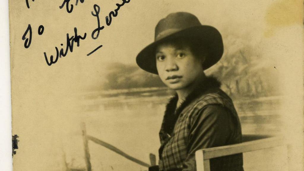 A woman sitting on a chair