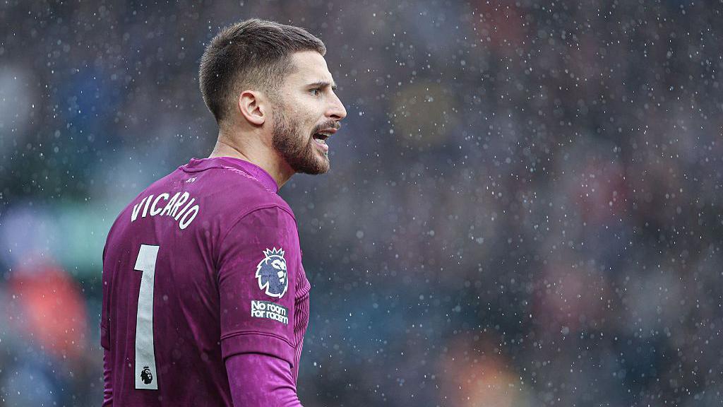 Guglielmo Vicario in action during the Premier League match between Leeds and Tottenham