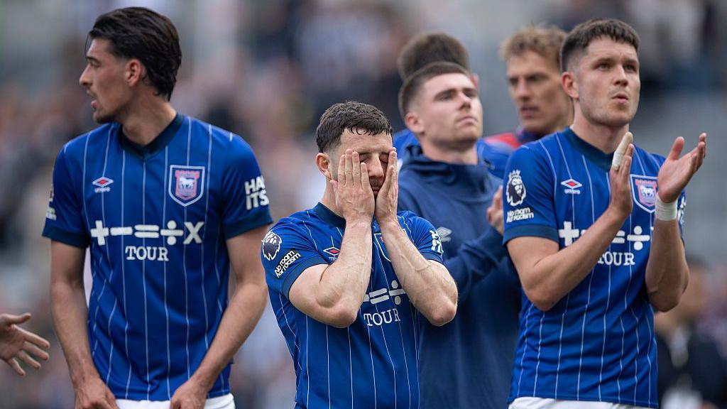 Ipswich players after relegation is confirmed