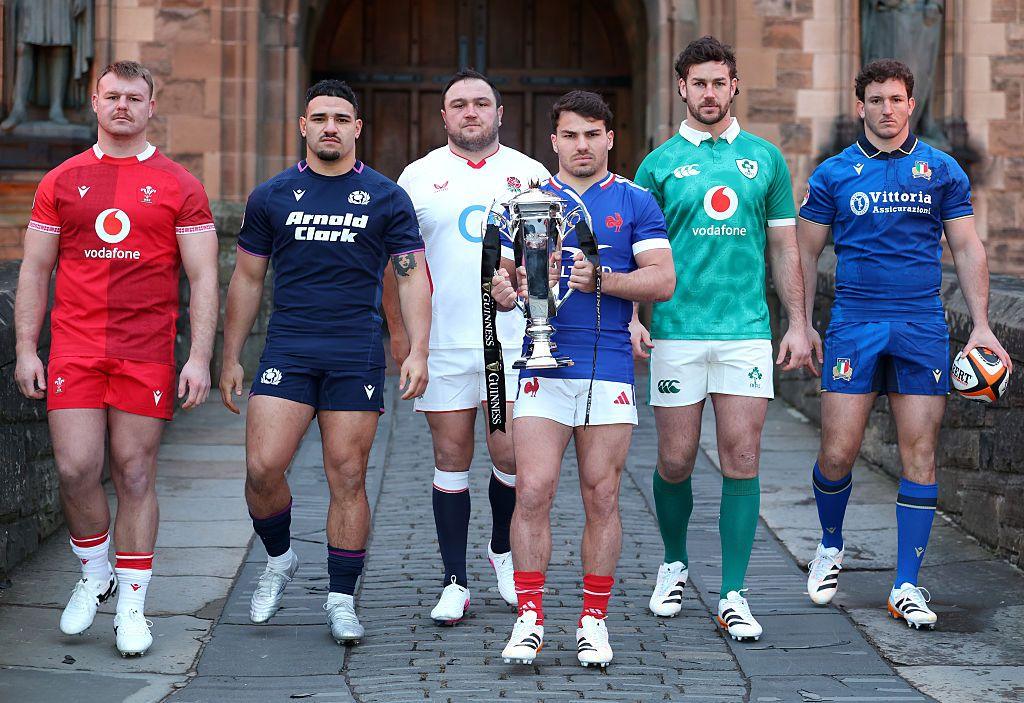 Dewi Lake of Wales, Sione Tuipulotu of Scotland, Jamie George of England, Antoine Dupont of France, Caelan Doris of Ireland and Michele Lamaro of Italy pose for a photo with the Guinness Six Nations trophy.