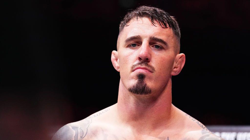 Tom Aspinall in action against Curtis Blaydes in 2024