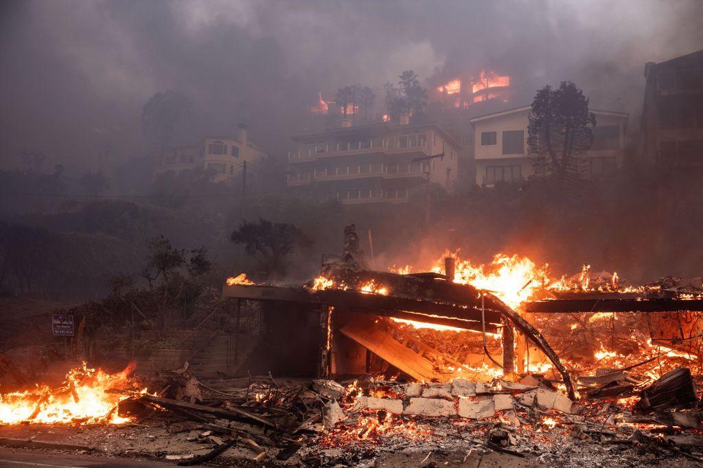 A photo showing beachfront and hillside homes in Malibu, California, burning in the Palisades fire on Wednesday, January 8, 2025.