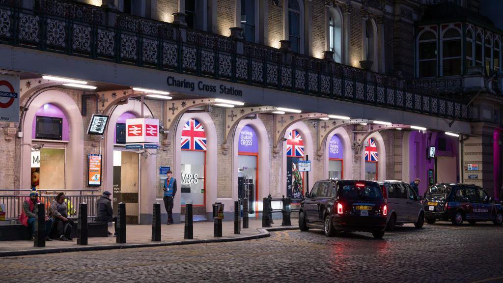 A general view of London black taxis outside Charing Cross London Underground Tube and railway station 