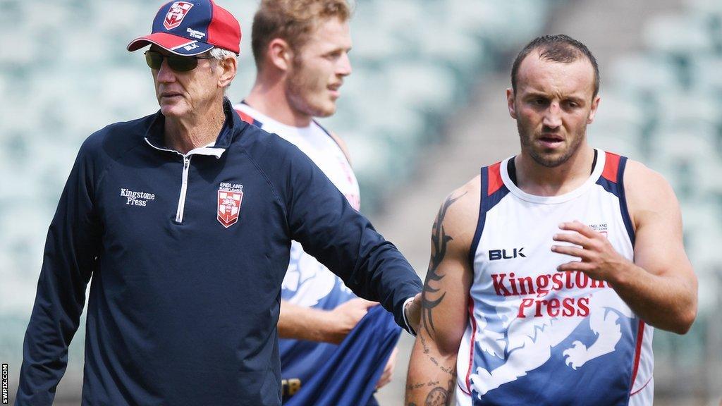 Josh Hodgson gets a pat on the back from head coach Wayne Bennett on England duty