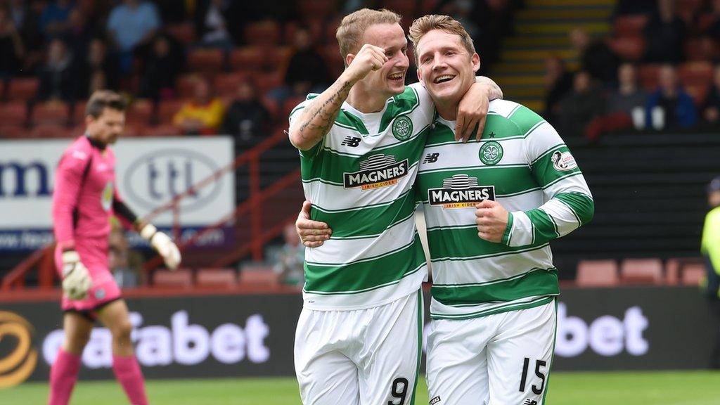 Kris Commons is congratulated on his goal by Leigh Griffiths