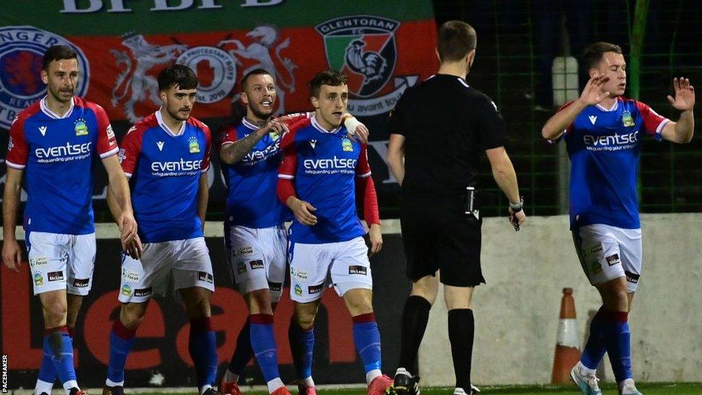 Linfield players congratulate first-half goalscorer Joel Cooper