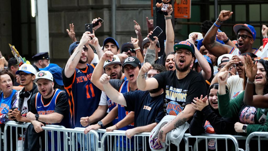 New York Knicks celebrate on the street