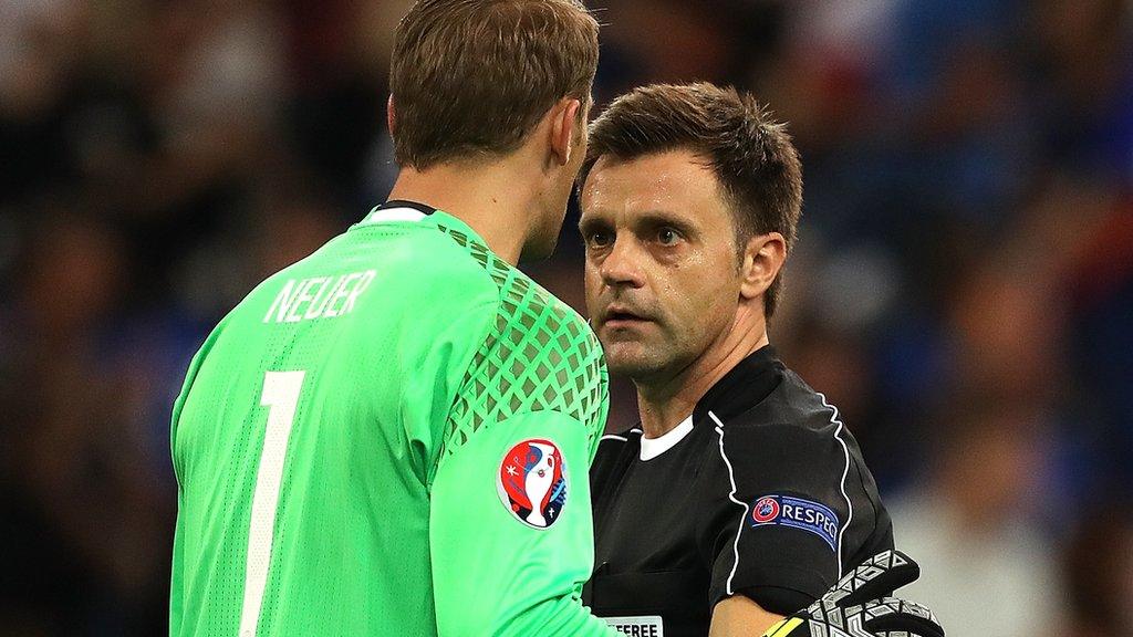 Germany's Manuel Neuer protests with the referee