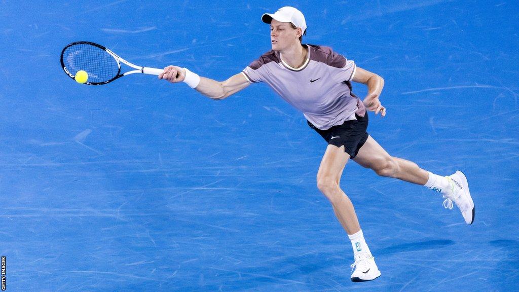 Jannik Sinner of Italy plays a forehand against Jesper de Jong