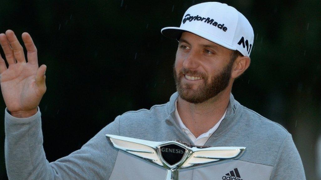 Dustin Johnson holds the Genesis Open trophy