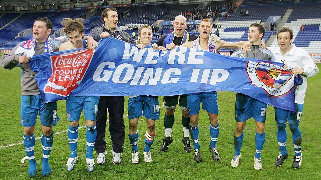 Reading players celebrate after gaining promotion to the premiership after the Coca-Cola Championship match between Leicester City and Reading at the Walkers Stadium on March 25, 2006 in Leicester, England.