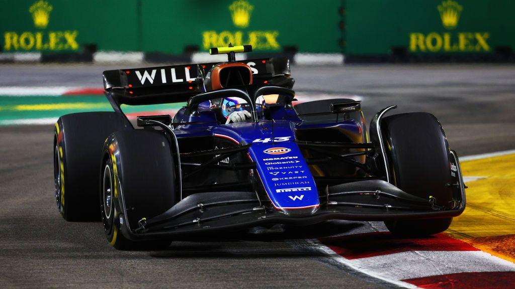 Franco Colapinto drives his Williams over a kerb during the Singapore Grand Prix