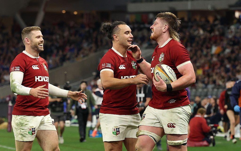 Joe McCarthy celebrates scoring the Lions' sixth try