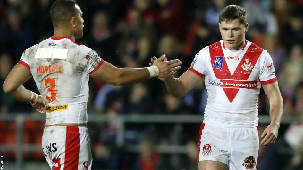 St Helens duo Will Hopoate and Jack Welsby shake hands