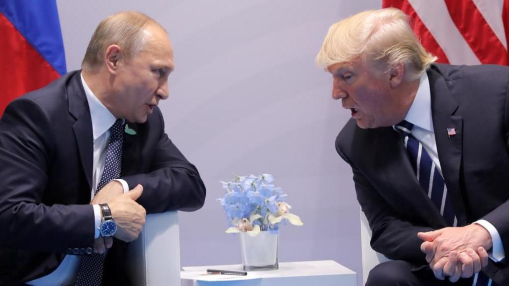 Putin and Trump sat down speaking to each other.