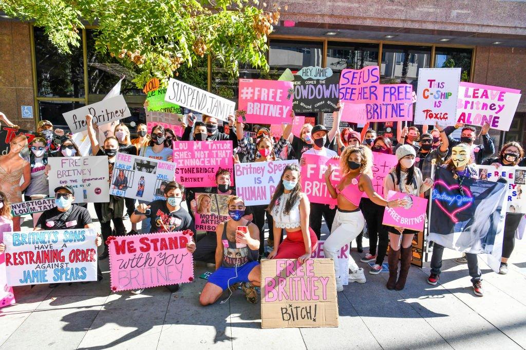 Fans protested outside the hearing